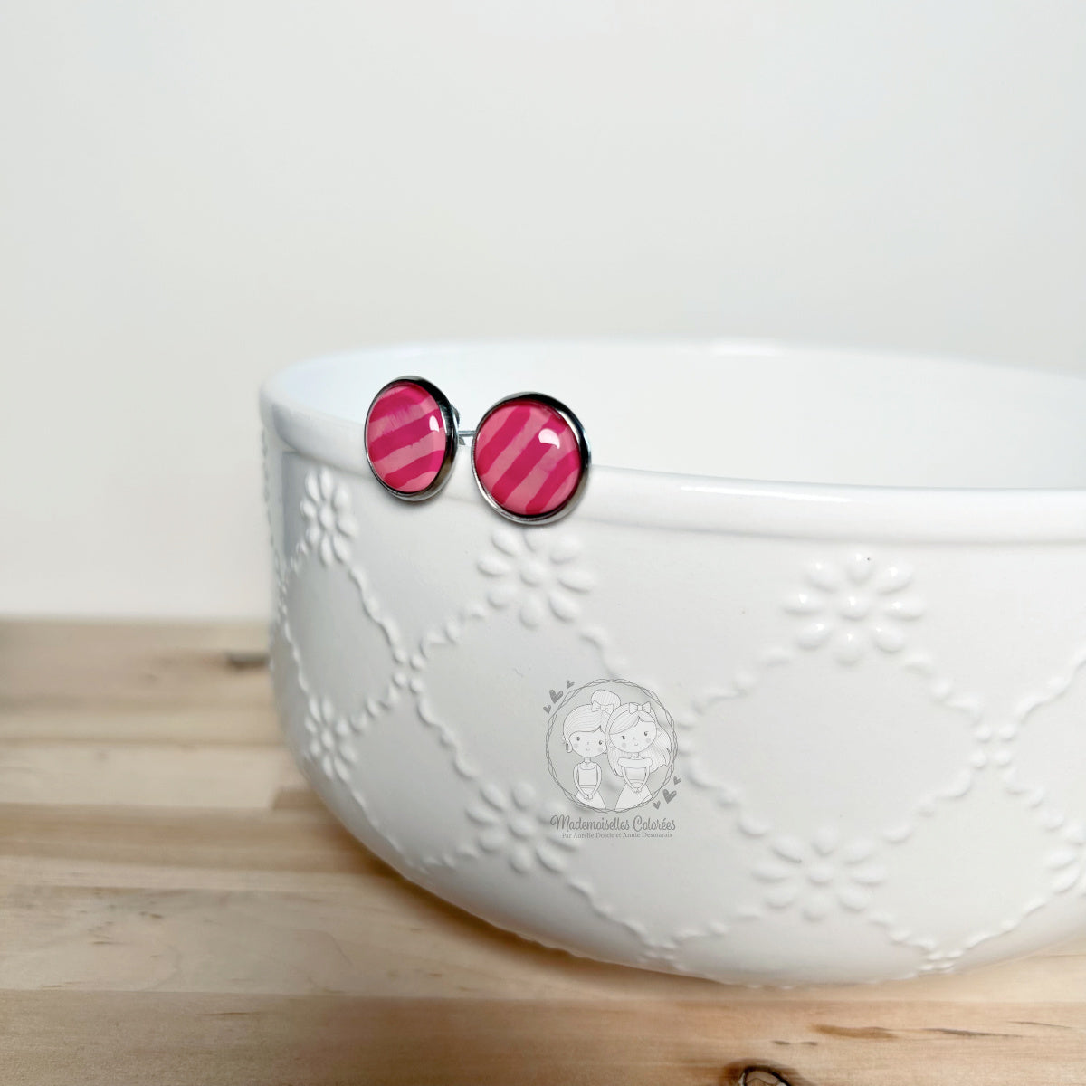 Clous d'oreilles lignés rose